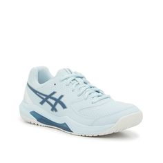 a women's tennis shoe in white and blue