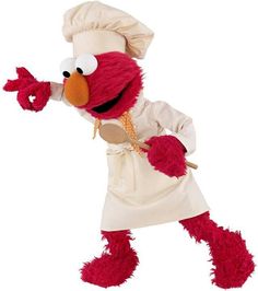 the sesame character is dressed in an apron and chef's hat while holding a spoon