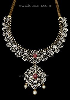 18 Karat Gold '3 in 1' Diamond Necklace with Color Stones & South Sea Pearls
  This Product has a Detachable Pendant which can be used as a separate Pendant with most Chains
  This Product has Inter Changeable Stones in the Necklace
  Length of the Pendant : 2.30 inches
  Width of the Pendant : 1.60 inches - 235-DN467 - in 81.850 Grams for USD $12747.05. 
Made in India by Totaram Jewelers Online this product is in Gold - 18 Karat Gold  & is an excellent gift for Adult - Women. Ships full Temple Jewelry Diamond Necklace With Single Cut Diamonds, Diamond Gemstone Necklace For Reception, Temple Jewelry Necklace With Single Cut Diamonds, Temple Style Diamond Necklace For Reception, Fine Jewelry Necklaces With Diamond Accents For Reception, Diamond Necklace With Single Cut Diamonds For Reception, Single Cut Diamond Necklaces For Receptions, Necklace Set Indian Bridal Jewelry, Detachable Pendant