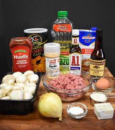 an assortment of ingredients on a wooden table