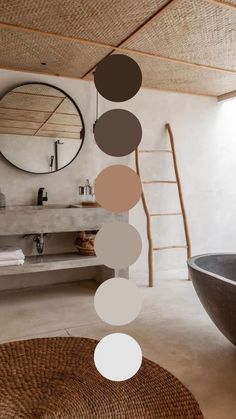 a bath room with a large round mirror and a wooden ladder in the wall above it