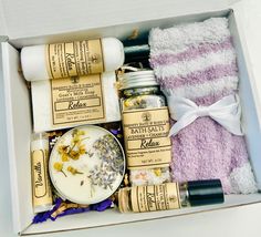 an open box containing bath products and towels