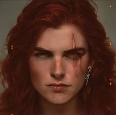 a woman with red hair and piercings on her face