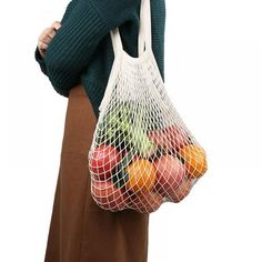 Mesh Grocery Bag Pure Cotton Environmentally Friendly for Vegetables And Fruits Sturdy Durable Description: 1. Quality: This mesh is woven with combed 21 cotton yarn and warp knitting machine, each inch 7 stitches, thick thread sewing. The products will be more robust and durable. 2. Environmental Protection: These mesh bags will replace plastic bags, cause they are safe and sanitary, healthy, and environmental protection. 3. Color: A variety of colors, there is always one for you. 4. Function: Large capacity, strong weight-bearing capacity. 5. Appearance: Fashionable and beautiful appearance. Specification: Product Name: Mesh grocery bag Product Material: Diamond-shaped mesh + cotton woven bags Product Size: 36*35*1cm/14.17*13.78*0.39inch Product Color: Beige, blue, black, red, yellow, gr Vegetable Bag, Reusable Produce Bags, Retail Bags, Grocery Tote Bag, Plastic Grocery Bags, Sustainable Bag, Grocery Shopping Bags, Chic Chic, Merchandise Bags