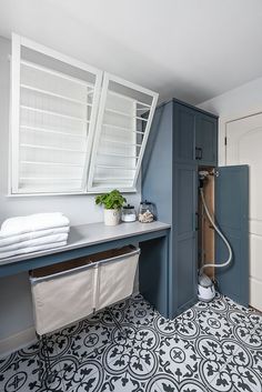 the bathroom is clean and ready to be used as a washroom for someone's needs