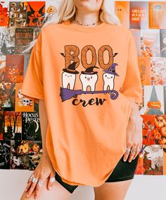 Comfort Colors® Dental Halloween Crew Group Shirt Trick Or Teeth Tshirt Halloween For Dental Assistant Hygienist Funny Dental Office Gifts These are Unisex Garment-Dyed T-shirt made 100% with ring-spun cotton. Shirts look retro and vintage. The soft-washed, garment-dyed fabric brings extra coziness to your wardrobe while the relaxed fit makes it an excellent daily choice. FEATURES - Medium fabric (6.1 oz/yd² (206.8 g/m - Relaxed fit - Sewn-in twill label - 100% ring-spun cotton - Without side se Orange Crew Neck Top With Character Print, Orange Short Sleeve Tops With Character Print, Orange Short Sleeve Top With Character Print, Orange Character Print Short Sleeve Top, Halloween Character Print Relaxed T-shirt, Funny Orange Short Sleeve T-shirt, Dental Halloween, Washing And Drying Machine, The Only Exception