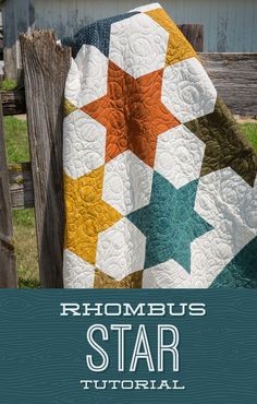 the cover of rhombus star quilt pattern is shown in front of a fence