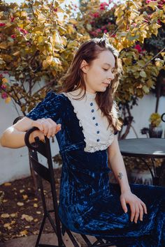 Velvet Victorian-style dress. Literally the world's most perfect velvet dress. I'm so in love with this piece! Beautiful blue crushed velvet with a lace collar and blue buttons. Zips in the back and features a little tie around the waist. ILGWU Union Made dress, likely from the 70s. 34 inch bust. 29 inch waist. 40 inch hips. Fits S/M. Blue Fitted Velvet Dress, Velvet Victorian Dress, Velvet Vintage Dress, Victorian Fashion Dresses, Vintage Velvet Dress, Nye Dress, Made Dress, Blue Crush, Union Made