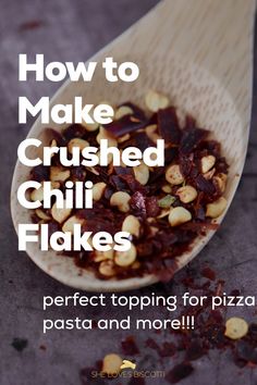 a wooden spoon filled with food on top of a purple tablecloth and text overlay reads how to make crushed chili flakes perfect topping for pizza pasta and more