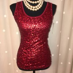 Red Sequin/Mesh Tank Top. Red Sleeveless Tops For Party Season, Red Sequined Top For Christmas, Glamorous Red Tops For Party Season, Glamorous Red Top For Party Season, Red Fitted Top For Party Season, Red Sequin Tops For Spring, Red Stretch Party Tops, Red Sleeveless Holiday Tops, Red Sleeveless Christmas Top