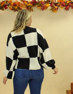 Introducing the Goldie Sweater - the ultimate winter style statement. This ultra warm and chic oversized checkered sweater is perfect for styling with jeans and boots for a cozy-cool look that will keep you warm on even the coldest winter days. The Goldie Sweater Features: Two available color combos: black/white, brown/white Oversized fit Slightly balloon sleeves Super warm fabric Fit note: This sweater is meant to fit a little oversized, but make sure to check the measurements for your preferre Trendy Plaid Sweater For Winter, Trendy Plaid Sweater For Fall, Oversized Plaid Sweater For Fall, Plaid Long Sleeve Sweater For Fall, Cozy Plaid Sweater, Oversized Plaid Sweater For Winter, Winter Day, Jeans And Boots, Black Sweaters