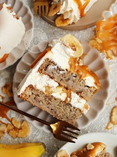 a piece of cake sitting on top of a white plate next to bananas and other desserts