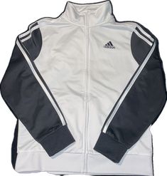 White Casual Track Jacket For Winter, White Track Jacket With Ribbed Cuffs For Outdoor, Adidas White Outerwear For Outdoor, White Adidas Outdoor Outerwear, Adidas White Outdoor Outerwear, White Adidas Track Jacket For Outdoor, Adidas White Track Jacket For Fall, White Winter Track Jacket With Ribbed Cuffs, White Adidas Track Jacket For Winter