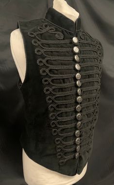 Military Waistcoat Black Gothic Raven SDL Clothing Steampunk Military style Waistcoat This is a Raven Clothing classic black cotton velvet mix waistcoat. It is a military style with ornate metal buttons.  This is available in two sizes and is a fitted waistcoat and fits chest  :- M 38/40" L 42/44 Thank you for looking Fitted Waistcoat, Gothic Raven, Military Aesthetic, Mens Waistcoat, Adventure Outfit, Victorian Steampunk, Gothic Steampunk, Creation Couture, Black Feathers