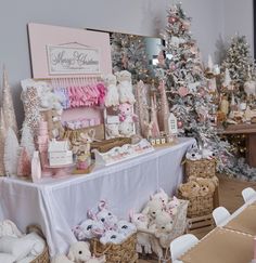 there are many stuffed animals on display in this room with christmas trees and other decorations