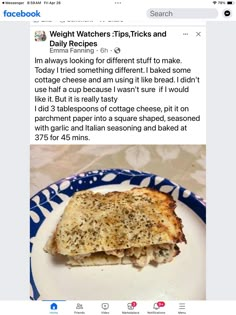 a white plate topped with a sandwich on top of a blue and white table cloth