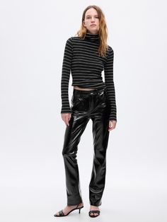 Fit: A full-length slim fit with a mini bootcut leg. ​ Fabric: 100% Polyester.  Stretch: No-Stretch Pants.  Rise: Mid Rise Jeans.  Look: A classic five-pocket pant in vegan patent leather.  Details: Zip fly & five-pocket styling.  Our Mid Rise Jean has a 10" 25 cm) rise. ​ Slim through the hip & thigh.  Mini bootcut leg. ​​ 17. 5" 44 cm) leg opening.  Full-length jean Inseam: Petite 27. 5" 67. 5 cm), Short 28. 5" 72 cm), Regular 30" 76 cm), Long 32" 81 cm), Tall 34″ 86 cm).  Models wearing Gap Boot Pants, Jeans Look, Bloomers Shorts, Bootcut Jean, Leather Baby, Burberry Jacket, Stretchy Jeans, Black Vegan, Baby Boots