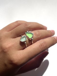 Handmade ring with sea glasses that handpicked from southwest England. Due to the nature of this, all the sea glass is different in size and colour. if you want a specific colour I can see what I have, I'll make sure to send you a picture of the sea glass that will be in your ring before making it🥰 All rings are made to order, so please allow me up to 3 days to complete your ring. I will get your order shipped out as soon as I finish making it☺️ All rings come with a cushion-lined Kraft gift box perfect for gifting! Aftercare: The sea glass ring is made from sterling silver so it won't irritate the skin or change colour. But I do recommend taking off your ring in the shower and avoiding spraying perfume on/near the ring. Follow the simple rules to keep your earrings bright and shiny! ✨ HO Ocean Ring, Sea Glass Ring, Ocean Jewelry, Glass Ring, Glass Rings, Handmade Jewellery, Gorgeous Earrings, Ring Sterling Silver, Ring Handmade