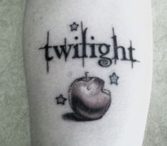 a black and white photo of an apple with the words twilight on it