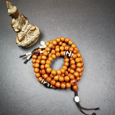 ❤This old bodhi seed beads mala was collected from Derge county,hold and blessed by a lama in Gengqing monastery, about 30 years old.It is composed of 108 bodhi seed beads, and is equipped with 3 dzi beads, silver spacer beads, bead counters and maini jewel clip,and finally consists a lucky knot bead on the end, very elegant.❤Details1. Handmade 108 bodhi beads approximately 10mm,mala's perimeter is about 100cm,40 inches.2. 1 pair of silver bead counters,length of 5cm and a diameter of 5.5mm,with Brown Polished Beads Mala For Meditation, Brown Polished Beads Spiritual Mala, Spiritual Brown Mala With Polished Beads, Brown Spiritual Mala With Polished Beads, Tibetan Mala, Lotus Sutra, Beads Mala, Green Tara, 3rd Eye