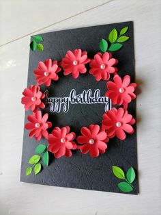 a handmade card with flowers and the words happy birthday