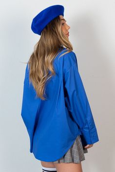 Who doesn't need a crisp oversized button down? The CALIstyle Not Your Boyfriends Oversized Shirt features a crisp cotton fabrication with oversized fit, front pocket, extra long sleeves and button cuff. Color: Cobalt Blue Oversized Button Front Extra Long Button Cuff Sleeve 100% Cotton Model Wearing Size Small and is 32B Bust, 5'5" Tall Oversized Blue Shirt For Work, Oversized Solid Shirt With Shirttail Hem, Oversized Shirt With Shirttail Hem, Oversized Solid Shirt For Workwear, Blue Oversized Shirt For Everyday, Oversized Blue Button-up Shirt, Oversized Shirt With Button Cuffs For Spring, Oversized Shirt With Button Cuffs For Fall, Oversized Button-up Shirt For Fall