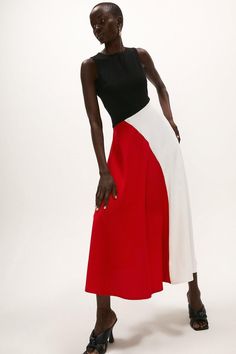 Style: Midi DressDesign: Colour BlockFabric: CrepeLength: MidiNeckline: CrewSleeve Length: Sleeveless Color Block Fashion, Contrast Outfit, Colour Block Dress, Flouncy Skirt, Colour Blocking Fashion, Flag Dress, Color Blocking Outfits, Block Colour, Sophisticated Outfits