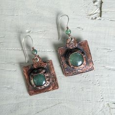 Handmade earrings "Patterns of Time" will set the mood and add charm to your everyday look. The green gemstone will accentuate the color of your eyes or your outfit! It's essential to remember that earrings, with their color and shape, complete your overall appearance! Pierced Green Copper Earrings, Green Copper Pierced Earrings, Handmade Dangle Earrings For May Birthstone, Handmade Drop Earrings For May Birthstone, Green Copper Earrings With Ear Wire, Spiritual Green Gemstone Earrings, Green Copper Earrings, Handmade Green Copper Earrings, Handmade Copper Green Earrings