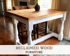 a wooden table sitting on top of a hard wood floor