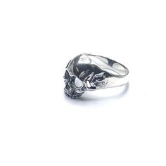 Chunky silver skull ring. Statement ring for him in solid silver . Available in size 7,8 and 9 Comes in a gift box Silver Skull Print Ring For Gift, Sterling Silver Skull Print Rings As Gift, Silver Rings With Skull Print For Gift, Sterling Silver Rings With Skull Print For Gift, Silver Ring With Skull Print For Gift, Silver Skull Print Jewelry For Streetwear, Silver Jewelry With Skull Print For Streetwear, Gothic Sterling Silver Rings With Skull Print, Gothic Silver Ring With Skull Print