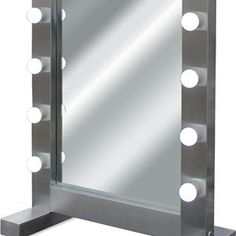 a large mirror with lights on it