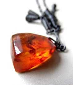 Old necklace with amber stone. Nice patina on metal and texture in amber. Baltic Amber Gemstone Necklaces, Amber Copper Pendant Necklaces, Spiritual Amber Necklace, Handmade Amber Metal Necklace, Amber Metal Necklace Perfect As A Gift, Amber Copper Necklace For Healing, Orange Baltic Amber Pendant Necklace, Baltic Amber Pendant Necklace, Amber Pendant Necklace In Baltic Amber