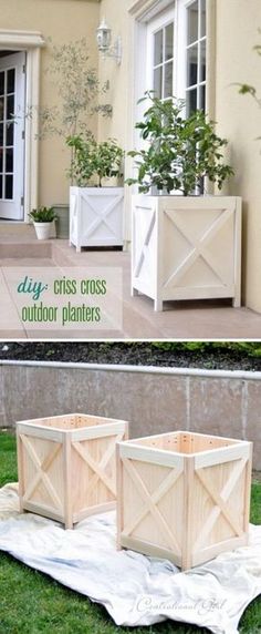 an outdoor planter made out of wooden crates on the ground and in front of a house