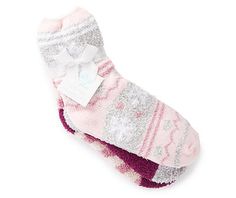 Keep your feet cozy this season in style with these pink snowflake slipper socks. Three seasonal pairs let you switch up your style as you please. The plush design is perfect for wearing around the house or even on Christmas morning. Cozy Pink Socks For Gifts, Pink Winter Socks For Gift, Pink Winter Socks For Gifts, Pink Winter Socks As Gift, Comfy Pink Socks For Stocking Stuffers, Comfy Warm Pink Socks, Pink Socks For Winter Stocking Stuffers, Pink Winter Socks, Comfy Pink Winter Socks