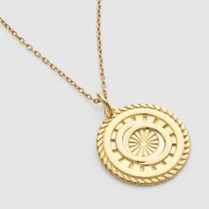 Made with 30 times thicker gold. Your everyday go-to, adorned with a rope frame and cast with two sunburst interlocking circles, this gold medallion coin necklace will be your guiding star for every adventure. This necklace is made entirely of sterling silver, and then coated in 14k gold plating. Featuring a rope frame, a sunburst base and two interlocking circles, this pendant measures approx. 20mm from top to base. Measures 44cm. All our orders are packaged and posted beautifully, perfect for 14k Gold Medallion Necklace With Rope Chain, Timeless Gold-tone Medallion Jewelry, Tarnish Resistant Timeless Medallion Necklace, Timeless Tarnish-resistant Medallion Necklace, Yellow Gold Medallion Necklace With Rope Chain, Rope Frame, Gold Sunburst, Gold Gift Boxes, Gold Medallion