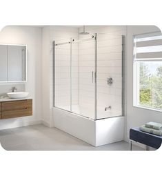 a bathroom with a sink, mirror and bathtub next to a window in it