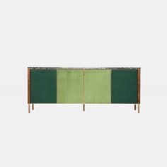 a sideboard with green and brown panels on the front, against a white background