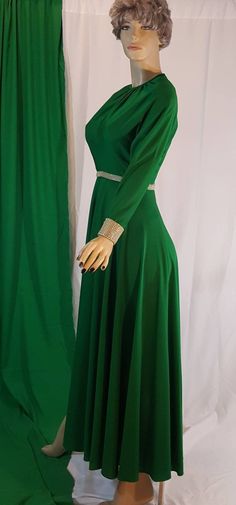 Long festive dress from the 60's 70's era.  Great for medieval cosplay or caroling on Christmas and Christmas play ( spirit of Christmas past)or st Patrick's day Retro party, mardi gras  This gorgeous vintage dress is full length with long sleeves . It closes with a zipper at the back and has beautiful rhinestone cuff and waist detail.  size S to M Model is 5 foot 9 inches See measurement on photo please Great vintage condition Victorian Cosplay, Medieval Cosplay, White Tux, Prince Clothes, Festive Dress, Long Green Dress, Tuxedo Women, Ankle Dress, Christmas Play