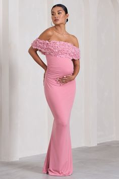 Both timeless and sophisticated. Inflorescence is a must-have maxi dress for any maternity wardrobe. Crafted in a premium stretch jersey known for its sculpting abilities. this form-flattering piece is defined by an artful array of mesh flowers across its bardot neckline. For an unforgettable wedding guest attire. try styling this fishtail maxi with some strappy heels and a classic sleek bun. Features - Premium stretch jersey - Bardot neckline- Floral mesh detail - Invisible zip closure - Bump r Elegant Pink Maternity Dress, Spring Maternity Floor-length Maxi Dress, Spring Maternity Maxi Dress Floor-length, Elegant Pink Maxi Maternity Dress, Elegant Pink Maxi Length Maternity Dress, Pink Maxi Maternity Dress, Pink Maxi Dress For Maternity Wear, Pink Maxi Length Maternity Dress, Elegant Pink Maternity Maxi Dress