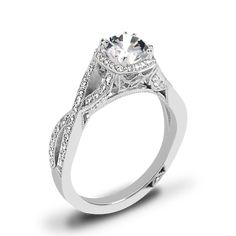 a white gold engagement ring with diamond accents