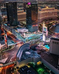 an aerial view of the las vegas strip and surrounding buildings at night with text overlay that reads, the metropolitan of las vegas