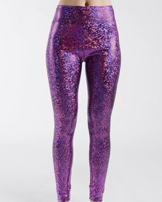 A MUST HAVE FOR ANY LEGGINGS ADDICT WANTING TO WOW THOSE FOLK ON THE DANCE-FLOOR!DETAILS:-High waist-Deep waist band -Stretchy fabric-Purple iridescent holographic fabric-Skinny fit-Standard lengthSIZING:S/M – would best fit a UK 8/10M/L – would best fit a UK 10/12CARE INSTRUCTIONS:Please cool hand wash ONLY with a gentle detergent to avoid losing the sparkle from your fabric. Please do not dry clean, iron or tumble dry.ORDERING:Each individual item is lovingly handmade in the UK in our studio i Disco Mermaid, Mermaid High, Holographic Fabric, Mermaid Leggings, Pink Holographic, Festival Accessories, Pink Leggings, Dance Floor, Catsuit