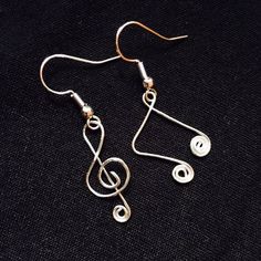 Treble Clef And An Eighth Note Earrings. They Are Made From Sterling Silver Wire And Sterling Silver Earrings Posts. #Style #Gemstone #Rock #Crystal #Trendy #Handmade #Gift #Her #Gems #Nature #Natural #Stone #Precious #Semiprecious #Statement #Metal #Chakra #Artisan #Chain #Indie #Forest #Intuition #Pride #Color #Luck #Love #Goth #Dainty #Witch #Magic #Beach #Glass #Sea #Fairy #Spring #Summer #Minimalist #Large #Boho #Winter #Fall Silly Earrings, Music Note Earrings, Music Earrings, Sea Fairy, Eighth Note, Apple Earrings, Patina Earrings, Boho Winter, Indie Jewelry