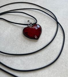 New heart pendant on a 132cm wax cord, when extender is used. Great addition to any outfit. What I really like about this pendant is it has true depth. It twinkles and catches the light really well, truely lovely. Please watch the video to truely appreciate this. I'm going to also offer this design and size of pendant as a choker in my choker range. Message me if you're interested as I'm uploading picture's shortly once I've created the piece. Adjustable Cord Heart Pendant Jewelry Gift, Heart-shaped Jewelry With Adjustable Cord As Gift, Heart Shaped Jewelry With Adjustable Cord As Gift, Heart Shaped Necklace With Adjustable Cord As Gift, Y2k Emo Grunge, Red Heart Necklace, Y2k Emo, New Heart, Emo Grunge