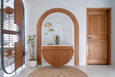 This 1,200-square-foot Ahmedabad home is an ode to subtle whimsy | Architectural Digest India Partition Designs, Leather Upholstered Bed, Entrance Door Design, Pooja Room Design, Foyer Design, Partition Design, Temple Design, Small Homes