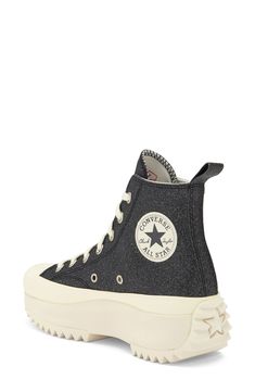 A sculpted platform and toothy, serrated sole jack up the stature of a high-top sporting an iconic Converse profile and a debossed star framed on the heel. Lace-up style Removable OrthoLite® insole with arch support Textile upper and lining/rubber sole Imported Converse Synthetic High-top Sneakers, Converse High-top Sneakers With Lug Sole, Converse High-top Platform Sneakers, Sporty Converse High-top Sneakers With Lug Sole, Converse Sneakers With Lug Sole For Streetwear, High-top Platform Sneakers With Textured Sole, Converse Sporty Platform Sneakers With Lug Sole, Converse Platform Sneakers With Round Toe, Sporty Converse Platform Sneakers With Lug Sole