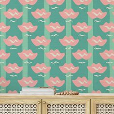 a wallpaper with pink and green shapes on it