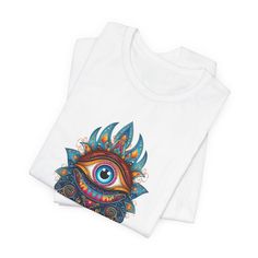 Hamsa Evil Eye Shirt, Boho Third Eye Tshirt,  Spiritual Shirt, Witchy Shirt, Witchy Gift, Spiritual Gift, Gift for Sister, Mom Welcome to my store! Our shirts are designed to add joy and color to your life. Feel free to ask me anything you may need help with, I'm happy to assist you in any way. *please note, there may be changes in the color shade depending on the screen on which the item is viewed. --------------------------------------------------------------------------------- Bella Canvas Tshirt .: Made with 100% Airlume combed and ring-spun cotton, a lightweight fabric (4.2 oz/yd² (142 g/m that is easy to layer, breathable. Perfect for active and leisure wear. .: The retail fit that is perfect for casual and semi-formal settings. The crew neckline adds a classic, neat style that's per Multicolor Short Sleeve Tops With Printing, Multicolor Crew Neck Shirt With Printing, White Cotton Shirt With Printing, White Printed Cotton Shirt, Multicolor Cotton Shirt With Printing, Multicolor Cotton Printed Shirt, Eye Shirt, Witchy Shirt, Hamsa Evil Eye