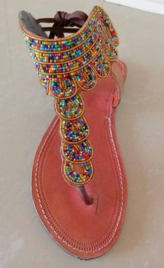 Unique Gift | Sandals | Gladiator Sandals | Greek Sandals | Beach Jewelry | Wedding Shoes | Leather Sandals | Custom | Mothers Gift This statement pair of sandals is superbly crafted. Main Color - Multicolored. Feel free to send me a convo or e-mail for any clarification or more information. Thank you for visiting, Luxury Beaded Women's Sandals, Luxury Beaded Sandals For Women, Cheap Traditional Summer Sandals, Native Indian Sandals, Luxury Multicolor Casual Sandals, Cheap Beaded Flat Sandals, Affordable Beaded Sandals For Spring, Luxury Multicolor Sandals For Vacation, Luxury Handmade Sandals For Summer