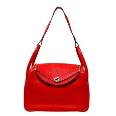 Hermes 2017 Lindy 30 Clemence Bag with Palladium Plated Hardware, Leather Lining, Turn-lock Closure at Front and Zip Closure at Top (includes Dustbag and Felt Insert, Clochette, Real Authentification Certificate) Designer = Hermes Color = Rouge Material = Leather Condition = Excellent Height = 8" Width = 11.5" Depth = 6 Class = Premier Location: Wilmette Item Number: 20201-68 Item ID: 300853 Category: Shoulder Bag High-end Bags With Turn-lock Closure For Everyday Use, Luxury Red Shoulder Bag With Turn-lock Closure, High-end Satchel With Turn-lock Closure, High-end Bags With Hasp Closure For Everyday Use, Luxury Travel Flap Bag With Hasp Closure, Designer Shoulder Bag With Hasp Closure For Daily Use, Red Leather Bags With Turn-lock Closure, Designer Rectangular Bag With Turn-lock Closure, Designer Rectangular Bags With Turn-lock Closure